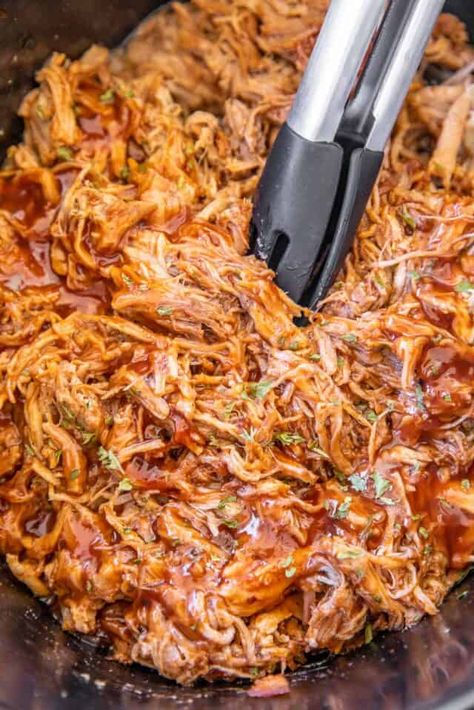 Slow Cooker Coca-Cola Pulled Pork with Coca-Cola BBQ Sauce Recipe - our go-to recipe for pulled pork with only 2 ingredients! The homemade barbecue sauce puts this pork over the top! Pork shoulder, Coca-Cola, ketchup, vinegar, onion, Worcestershire sauce, chili powder, and salt. Great for Memorial Day, 4th of July, Labor Day & tailgating. Leftovers are great on a salad, in tacos or NACHOS! YUM! #crockpot #slowcooker #bbq #pork #pulledpork Pulled Pork In Slow Cooker, Pork In Slow Cooker, Coke Pulled Pork, Slow Cooker Bbq Pulled Chicken, Slow Cooker Pulled Chicken, Pull Pork, Pulled Pork Roast, Bbq Pulled Pork Slow Cooker, Bbq Pulled Chicken