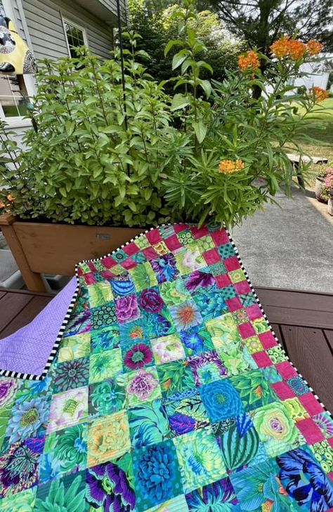 Quilt Along with Pat Sloan | My version of a Kaffe Fassett seed packet quilt decorated with a bright pink Moda Grunge checkerboard border | Facebook Seed Packet Quilt, Kaffe Quilts, Moda Grunge, Kaffe Fassett, Seed Packets, Bright Pink, The Back, Quilting, Seeds