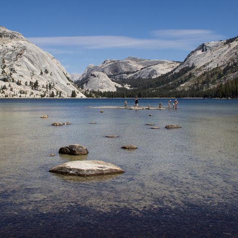 Carved out by the Tenaya Glacier that extended from Tuolumne Meadows down to Yosemite Valley during the last ice age, Tenaya Lake is an alpine lake located along Highway 120/Tioga Pass Road along the gateway to Yosemite’s granite-laden high country. Popular with summertime swimmers and paddlers, Tenaya Lake is the largest easily accessible lake in Yosemite. The Tenaya Lake Tuolumne Meadows, Yosemite Camping, California Hikes, Sunrise Lake, Backcountry Skiing, Travel Tops, Adventure Guide, Yosemite Valley, Alpine Lake