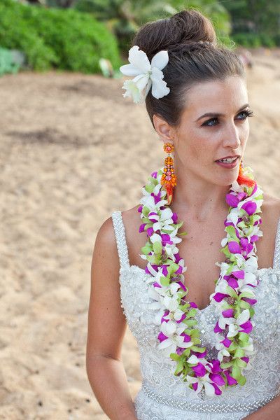 We love how this bride did her hair and makeup for her Hawaiian wedding! {Micko Photo} Wedding Vow Renewal Ceremony, Lei Making, Bridal Party Accessories, Tropical Destination Wedding, Beachy Wedding, Flower Lei, Wedding Vows Renewal, High Bun, Hair Flowers