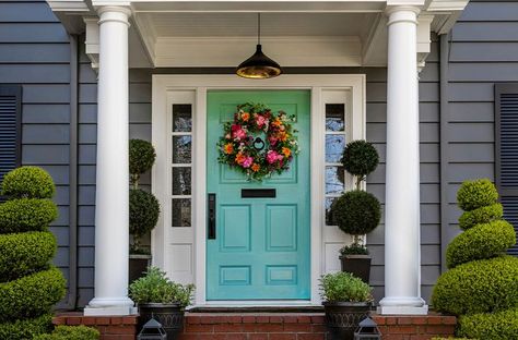 Giving your front door a fresh coat of paint is a low-stress project that adds instant curb appeal to your home, whether you’re just repainting the existing colour, or going for something bold and different. And for this type of paint job, the hardest part might just be choosing the colour. We’ve got some resources to get the inspiration flowing and get the job done. Read More: https://timbermart.ca/en/boost-your-curb-appeal-repaint-your-front-door/ Grey Exterior House, Brown Front Doors, Grey Exterior House Colors, Orange Front Doors, White Front Door, Pink Front Door, Green Front Doors, Black Front Doors, Painted Front Doors