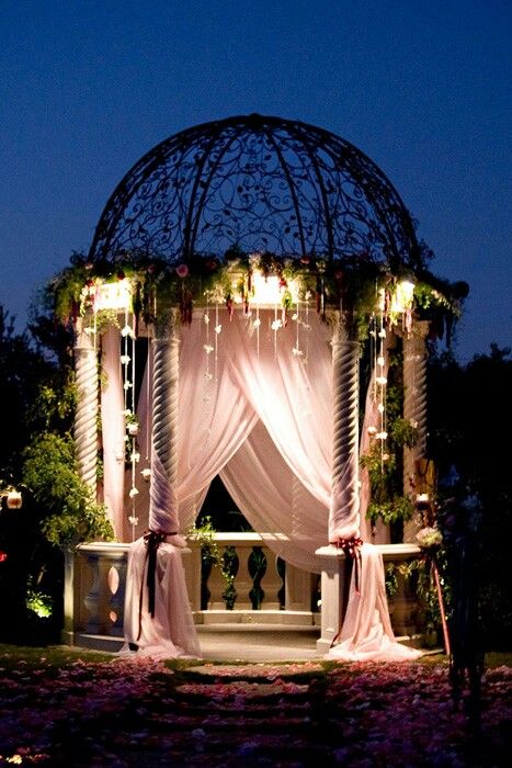 Gazebo with fabric draping & lighting – such structures inspire wedding photographs and create settings for other intimate moments Gazebo Lighting, Gazebo Decorations, Gazebo Wedding, Garden Gazebo, Outdoor Wedding Ceremony, Garden Wedding, Secret Garden, Beautiful Photo, Outdoor Spaces