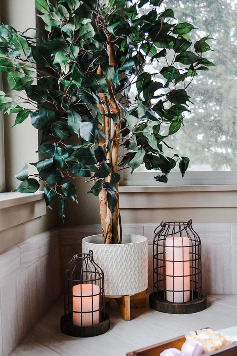 artificial plant, ficus tree, silk leaves, ceramic planter, candle holders, best candle holders, metal candle holders, bathtub decor, bathroom decor, bathroom decor ideas, how to decorate a bathroom Bathtub Candle Decor, Around Tub Decor Ideas, Corner Bath Tub Decor, Decorate Around Bathtub, Bathtub Ledge Decor, Bathtub Plants Decor, Around Bathtub Decor, Garden Bathtub Decor, Bathtub Corner Decor