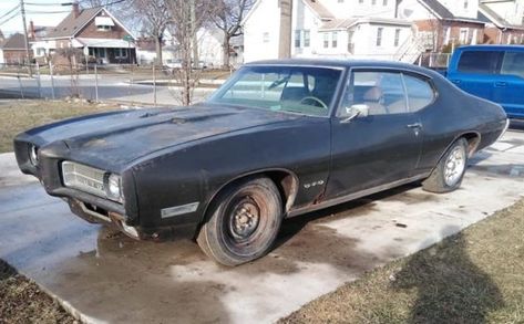 All original 1969 Pontiac GTO barn find! This one has been sitting for 25 years but looks like a solid foundation to bring a very desirable muscle car back to its former, running grandeur. #PontiacGTO 1969 Gto, 1969 Pontiac Gto, Pontiac Lemans, Barn Garage, Pontiac Gto, Green Interiors, Barn Finds, Bucket Seats, Cool Rides