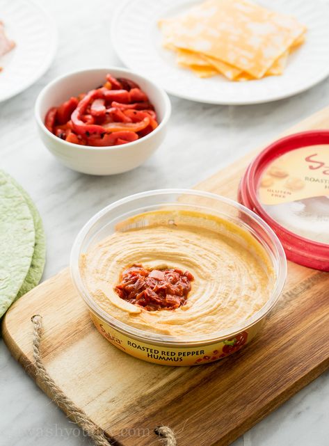 These Roasted Red Bell Pepper Hummus Pinwheels are full of so much flavor and are the perfect appetizer for any game day! Red Bell Pepper Hummus, Hummus Pinwheels, Bell Pepper Hummus, Turkey Pinwheels, Roasted Red Bell Pepper, Cream Cheese Pinwheels, Creamy Salsa, Greek Yogurt Dips, Kid Lunches