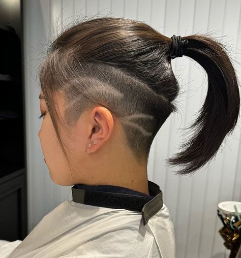 Fade Ponytail with Undercut Design Ponytail With Undercut, Shaved Hairstyles For Women, Undercut Ponytail, Undercut Nape, Undercut Design, Half Shaved Head, Under Cut, Shaved Design, Shaved Hairstyles