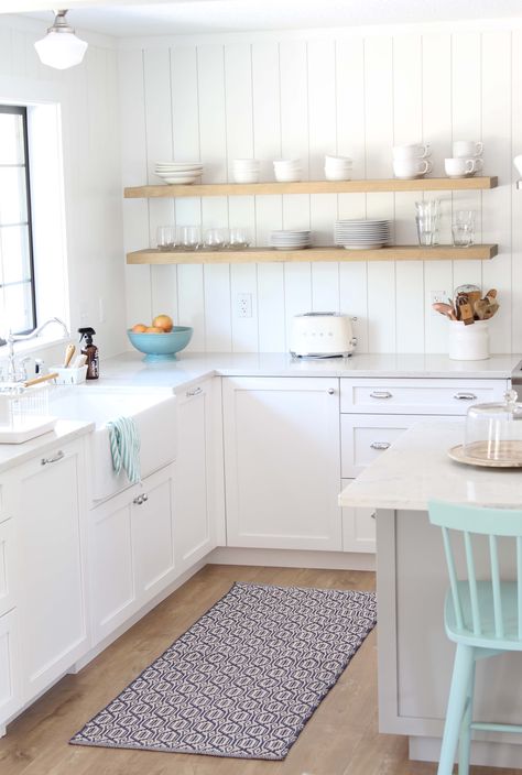 Such an adorable kitchen! Love the vertical shiplap and open shelving! #scandinaviankitchenstyle #modernfarmhousekitchen #whitekitchen #openshelving #graykitchen Vertical Shiplap In Kitchen, Kitchen Vertical Shiplap, Vertical Shiplap Backsplash, Scandinavian Kitchen Backsplash, Scandinavian Farmhouse Kitchen, Beadboard Kitchen Backsplash, White Scandinavian Kitchen, Shelves Styling, Garage Redo