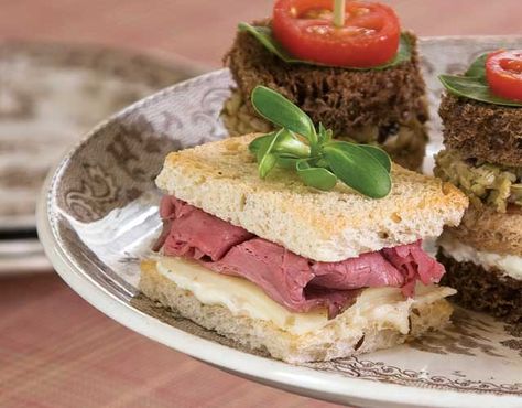 All the best flavors of a classic roast beef sandwich are presented here: rye bread, Swiss cheese, and Horseradish Cream. Roast Beef Tea Sandwiches, Beef And Horseradish, Classic Roast Beef, Beef Tea, Roast Beef And Horseradish, Classic Roast, Tea Party Sandwiches, Roast Beef Sandwich, Tea Sandwiches Recipes