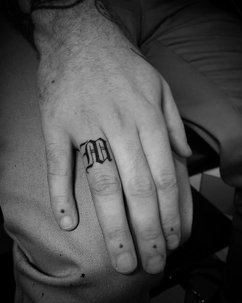 Handpoked old english “M” for my buddy @mrlevinetto , congrats with your engagement bro! #oldenglish #handpoke #fingertattoo #blackworkerssubmission #blxckink #blacktattooart #tttism #tattrx #equilattera (bij Glorybound Antwerp) Old English M Tattoo, Old English M, Finger Letter Tattoos, Letter R Tattoo, Old English Tattoo, Old English Letters, M Tattoos, Ring Finger Tattoos, Old English Font