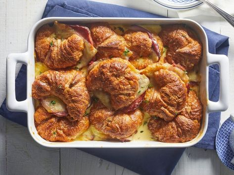 Stuffed Ham-and-Cheese Croissant Casserole Recipe Breakfast Casserole With Croissants, Grits Dishes, Millionaire Bacon, Stuffed Ham, Sausage Strata, Overnite Oats, Croissant Casserole, Party Rolls, Grits Breakfast