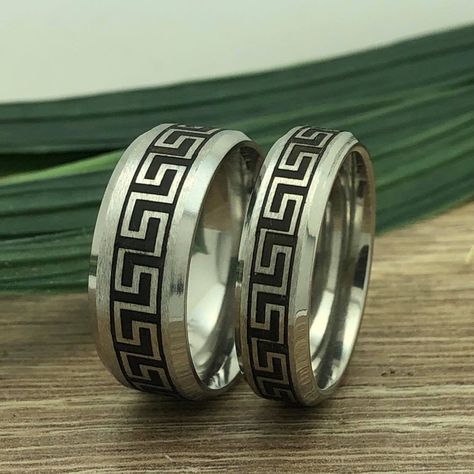 This rings is made of high quality two tone Titanium and features a Laser Engraved Greek Key Design all around the ring. Perfect for Beach Weddings and for Ocean Lovers. HOW TO ORDER CUSTOMIZATION -FOR INSIDE ENGRAVING 1) Please select the ring size you need 2) type in the text that you want us to engrave ( up to 25 characters including spaces) and specify the type of font that you want us to use upon checkout. NOTE: PLEASE MAKE SURE OF YOUR RING SIZE, ALL PERSONALIZED CUSTOM ENGRAVED ITEM(S) AR Aztec Rings, Rings Matching, His And Hers Rings, Couples Ring, Couples Ring Set, Men's Wedding Ring, Aztec Designs, Key Design, Beach Weddings