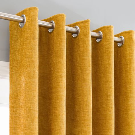 Crafted from durable quality materials, this pair of curtains are part of our popular Chenille collection and have been finished in a modern mustard yellow colourway. Plain in design, these curtains have been made with an eyelet heading for ease of hanging and are suitable to create elegant folds to suit all types of home decor. Ideal to provide added privacy by blocking the view from the outside into the room, our Chenille curtains are fully lined for added insulation and help to prevent draugh Yellow Curtains Bedroom, Bedroom Decor Yellow, Yellow Curtains Living Room, Beige Curtains Living Room, Yellow Bedroom Walls, Jewel Tone Decor, Mustard Yellow Curtains, Curtains Yellow, Chesterfield Sofa Living Room