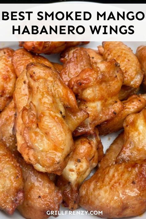 These smoked mango habanero wings are sweet, smokey, and have just enough spice to take the flavor profile to the next level. | smoked mango habanero wings | mango habanero wing sauce | best hot wings sauce recipe | the best hot wings recipe sauces | smoked hot wings recipe | best smoked wings recipe | traeger smoked wings recipe | mango habanero sauce wings | mango habanero hot sauce | mango habanero wings recipes Best Smoked Wings Recipe, Best Hot Wings Recipe, Smoked Hot Wings Recipe, Mango Habanero Wing Sauce, Mango Habanero Wings Recipe, Smoked Wings Recipe, Habanero Wing Sauce, Wings Sauce Recipe, Hot Wings Sauce