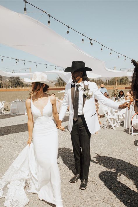 Wedding Dress With Cowgirl Hat, Cowgirl Hat Wedding Dress, Cowboy Boot Wedding Dress, Cowboy Hat Wedding Dress, Tux With Cowboy Boots, Cowboy Wedding Outfit, Wedding Dress With Hat, Wedding Cowboy Hat, Cowboy Hat Wedding