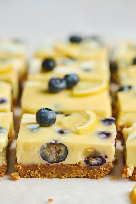 If you love Lemon Bars you are going to absolutely love these Lemon Blueberry bars. Each bite contains an explosion of tastes and textures Lemon Raspberry Bars, Lemon Blueberry Bars, Blueberry Cheesecake Bars, Blueberry Bars, Lemon Blueberry Cheesecake, Blueberry Compote, Blueberry Desserts, Blueberry Recipes, Blueberry Cheesecake