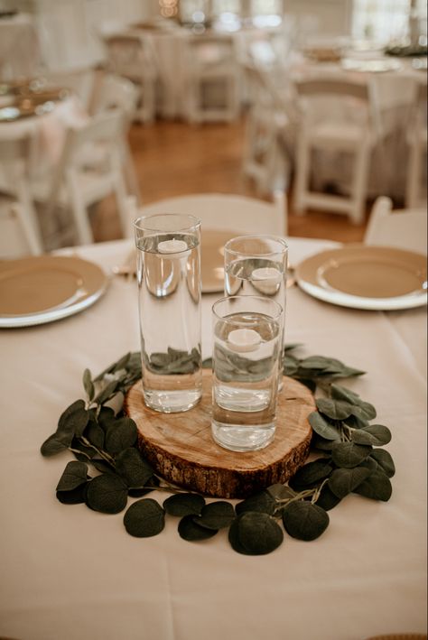 Wood Cookies Centerpiece, Floating Candles On Wood Centerpieces, Eucalyptus Candle Centerpiece Round Table, Wood Circle Centerpiece, Wood Round Candle Centerpiece, Wood Eucalyptus Centerpiece, Centerpiece With Floating Candles, Wood Slice Centerpiece Wedding Faux Flowers, Wood Slice Centerpiece