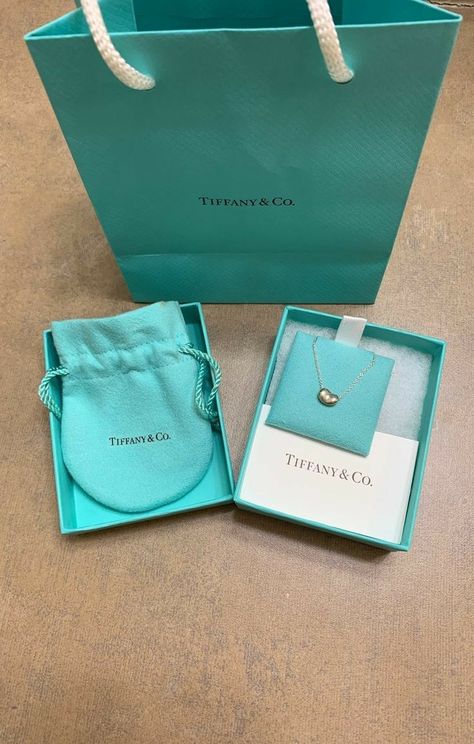 Bean Necklace, Jewelry Product Shots, Tiffany And Co Jewelry, Tiffany And Co Necklace, Multiple Earrings, Jewelry Lookbook, Tiffany And Co, Bag Packaging, Jewelry Inspo