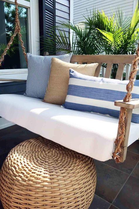 Florida Front Porch Ideas, Coastal Porch Ideas, Coastal Front Porch, Sunroom Layout, Coastal Porch, Farmhouse Porch Swings, Porch Refresh, Beach Porch, Wicker Ottoman