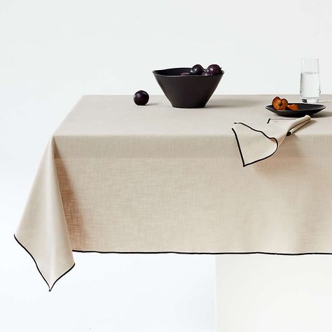 Mercer Merrow-Stitch Warm Natural Organic Cotton Tablecloth + Reviews | Crate & Barrel Modern Tablecloths, Colorful Dinnerware, Black Embroidery, White Table Cloth, Dining Table Black, Cotton Tablecloths, Dining Room Living Room, No Matter How, Organic Modern