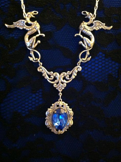 Silver medieval griffins, filigree, with crystal blue stone. Griffin Jewelry, Medieval Necklace, Necklace Sapphire, Metal Craft, Luxury Jewellery, Crystal Blue, Neck Chain, Unique Jewelry Designs, Fantasy Jewelry