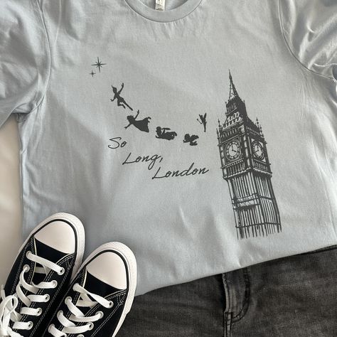 One of our favorite shirts! This oversized loose fit tee is perfect for a day around town or better yet at a theme park! With a touch of pixie dust and a whole lot of Swiftie attitude what could go wrong! #disney #disneyworld #disneyland #peterpan #pixiedust #tswift #taylorswift Disney Park, Fairy Dust, Mom Boss, Pixie Dust, Disney Shirts, Disney Inspired, Shopping Trip, Theme Park, Peter Pan