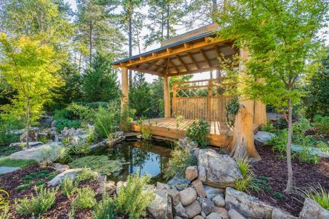 This peaceful Zen garden features a pavilion of bamboo and white cedar for introspective moments gazing into the reflecting pond. The pavilion can be reached by crossing an attractive wooden bridge that rises over a small stream running from the pond. Jazz Clubs, Outdoor Water Feature, Building A Pergola, Backyard Water Feature, Asian Garden, Backyard Pergola, Backyard Paradise, Fish Ponds, Backyard Retreat