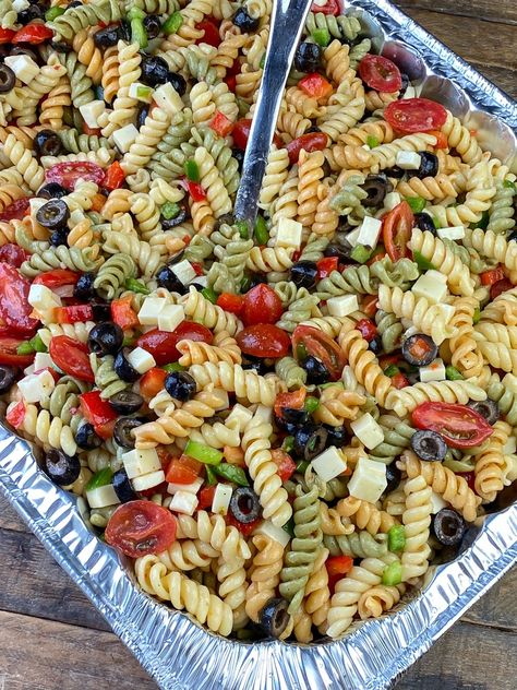 Tri colored rotini pasta salad with cherry tomatoes, olives, cheese, bell peppers and Italian dressing Try Color Pasta Salad, Box Pasta Salad Add Ins, Classic Italian Pasta Salad Recipes, Outside Birthday Party Food Ideas, Pasta Salad Recipes Tri Color, Pasta Salad With Rotini Noodles, Tri Color Pasta Salad Recipes Cold, Tri Color Rotini Pasta Salad, Tri Color Noodle Pasta Salad