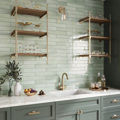 Looking for ways to transform a flat and boring wall into an exciting design feature? This textured subway tile can bring dimension to every room of your house! Whether you're updating a kitchen backsplash, renovating the entire bathroom, or aiming for a quick accent wall project, these ceramic tiles play with light, color, and texture in a truly exciting way. It adds a rich cobalt blue color and an authentic surface detail to any indoor design project. A stunning way to finish off a shower nich Green Kitchen Backsplash, Textured Subway Tile, Green Tile Backsplash, Textured Subway, Green Subway Tile, Green Backsplash, Stove Backsplash, Серая Кухня, Sage Green Kitchen