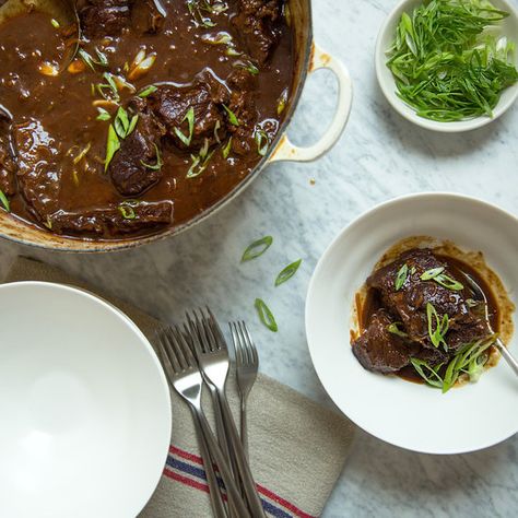 These best-ever short ribs get meltingly tender in a sauce made with sherry, cherries, mirin, miso and soy sauce. Get the recipe at Food & Wine. Cooking Short Ribs, Vindaloo Recipe, Braised Short Ribs Recipe, Boneless Short Ribs, Dinner Party Dishes, Short Ribs Recipe, Short Rib, Ribs Recipe, Braised Short Ribs