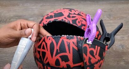 This is a guide to making a DIY basketball purse. Learn how to make a basketball purse with this easy step-by-step tutorial. Sneaker Gala, Football Purse, Basketball Purse, Diy Basketball, Snap Tape, Sneaker Ball, Basketball Bag, Purse Tutorial, How To Make Purses