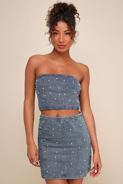 The Lulus Glamorous Vibe Medium Wash Denim Two-Piece Mini Dress is ready for cocktails, dancing, and making memories with your besties! This too-cute, cotton denim dress set is embellished with glowing faux pearls and dazzling rhinestones that create a party-ready design. The flirty crop top features a strapless, princess-seamed bodice and an elasticized straight neckline. The matching skirt boasts a high-rise fit and an A-line silhouette that falls to a sultry mini hem. The top features an exposed zipper and clasp closure at the back, while the skirt has a hidden side zipper/clasp. Fit: This garment fits true to size. Length: Mid-thigh. Bust: Works best for A to C cup sizes - consider sizing up for fuller bust. Waist: Fitted - very fitted at natural waist. Hip: Fitted - consider sizing up Denim And Pearls Outfits Party, Diamonds And Denim Party Outfits Chic, Bachelorette Denim Theme Outfits, Denim And Diamonds Bachelorette Party, Denim And Diamonds Outfit, Denim And Pearls Outfits, Denim And Diamonds Party Outfit, Denim Party Outfit, Diamonds And Denim Party