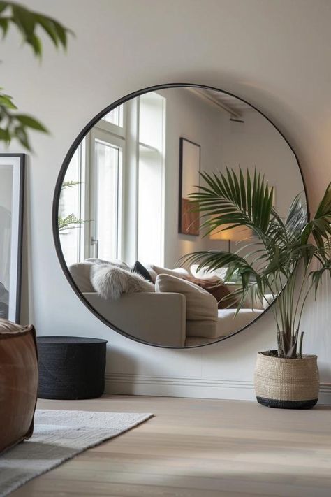 How To Hang Round Mirror: Stylish Display Techniques Circle Mirror Above Sofa, Alcove Mirror Ideas, Huge Round Mirror, Big Round Mirror Entryway, Round Entry Mirror, Large Round Mirror Decor Ideas, Mirror And Chair In Bedroom, Round Mirror In Bedroom, Round Mirror Decor Ideas Living Room