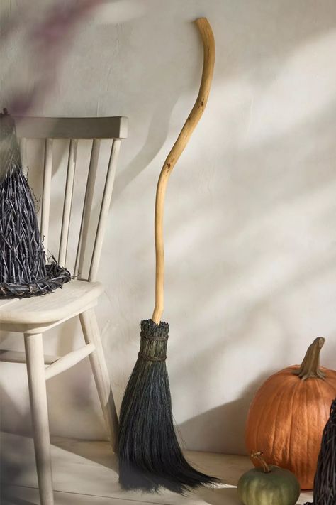 This handcrafted witch's broomstick isn't just a Halloween decoration, it can actually be used to sweep dusty floors with. Unfortunately, it doesn't fly though. Handmade Broom, Cast Iron Decor, Witches Broomsticks, Black Grass, Bat Wall, Outdoor Living Furniture, Organic Decor, Glass Pumpkins, Brooms