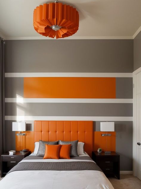 Create a statement in your bedroom with an accent wall in a striking shade of grey and orange. Complement the wall with sleek white furniture and vibrant orange decorative accents for a modern and energetic vibe. Orange Accent Wall, Orange Accent Walls, Grey And Orange, Orange Accents, White Furniture, Decorative Accents, Vibrant Orange, Shades Of Grey, Spice Up