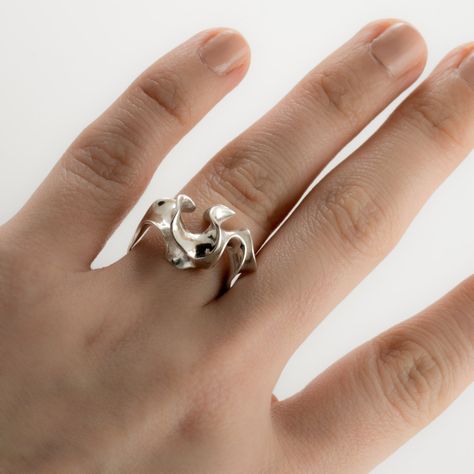 A simple band blooms into an intricate convolution of sterling silver. This ring is 3D printed in wax, then cast in silver using lost wax casting. Also available in brass, 14k gold, 18k gold, palladium, and platinum by special order. Our Florescence collection is inspired by the biomechanics of growing leaves and blooming flowers. Each piece emerges from a computational simulation of differential growth, a surface that grows at different rates in different location. The flowering structures expa Lost Wax Casting Rings, Wave Jewelry, Silver Casting, Wax Ring, Wax Carving, Simple Band, Wave Ring, Funky Jewelry, Cluster Earrings