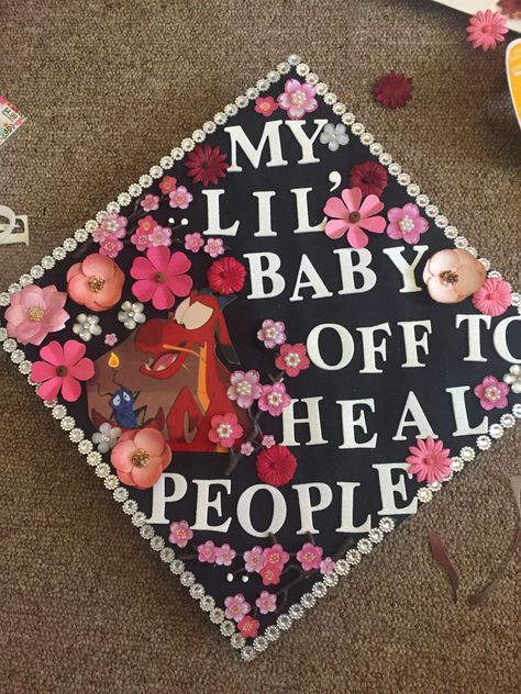 Mulan Graduation cap. RN graduation Disney Nursing school Disney Nursing Graduation Cap, Disney Princess Graduation Cap, Mulan Graduation Cap, Funny Grad Cap Ideas, Bsn Graduation Cap, Nurse Graduation Cap Designs, Disney Graduation Cap, Graduation Nursing, Graduation Box