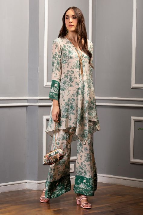 Shop for these amazing collections of Green Crepe Floral V Neck Tunic And Pant Set For Women by Sakshi Girri online at Aza Fashions. Co Ords Outfits Indian, Co Ords Outfits, Sets Outfit, V Neck Tunic, Bell Pants, Pakistani Fashion Casual, Green Tunic, Floral Print Tunic, Indian Fashion Designers