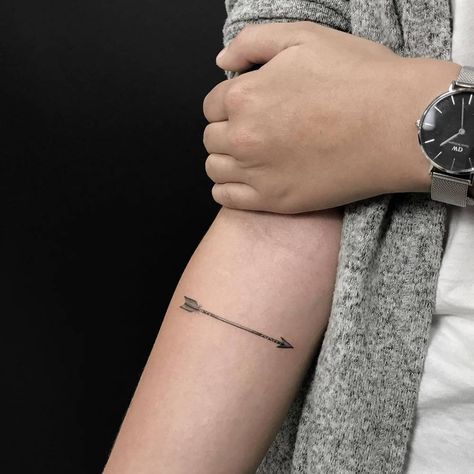 Fine line arrow tattoo on the right inner forearm. Simple Arrow Tattoo, Meaning Of Arrow Tattoo, Arrow Tattoo Design, Small Quote Tattoos, Single Needle Tattoo, Small Tattoos With Meaning, Heart Tattoo Designs, Arrow Tattoo, Arrow Tattoos