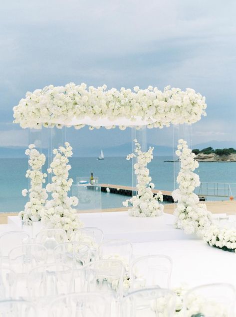 Glam Beach Wedding Ceremony, Beach Wedding White Flowers, Florida Beach House Wedding, All White Wedding Ceremony Decor, White Flower Chuppah, Expensive Wedding Decor, Nobu Wedding, Beach Wedding Altar, All White Beach Wedding