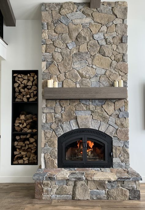 Stone Fireplace With Insert, Cobblestone Fireplace Ideas, Creek Rock Fireplace, Stone Veneer Fireplace Rustic, Cabin Fireplace Ideas Stone, Stone Fireplace Aesthetic, Fieldstone Fireplace Ideas, Natural Rock Fireplace, Gray Washed Stone Fireplace