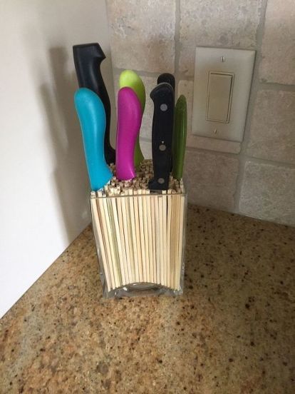 With a few simple items you can create a unique way to display your knives . | sponsored Gel Stain Kitchen Cabinets, Organising Ideas, Black Shelf Brackets, Stained Kitchen Cabinets, Organizational Skills, Magnetic Knife Holder, Easy Diys, Kitchen Utensil Holder, Diy Kitchen Storage