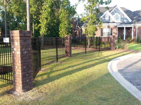 Brick columns with Steel fence Metal Fence With Brick Columns, Black Fence With Stone Columns, Fence With Brick Columns, Driveway Fence, Brick Columns, Country Fences, Rustic Fence, Cheap Fence, Natural Fence