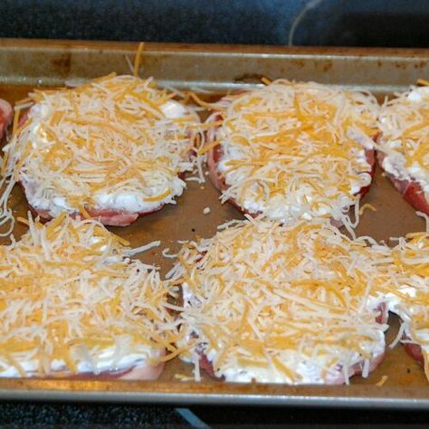 Potato And Pork Chop Recipes, Cheddar Baked Pork Chops, Pork And Cream Cheese Recipes, Pork Chop Recipes Cream Cheese, Baked Pork Chops With Sour Cream, Cheesy Pork Chop Casserole, Pork Chops With Mayo And Parmesan, Cream Cheese Pork Chops Baked, Boneless Pork Chop Recipes Easy