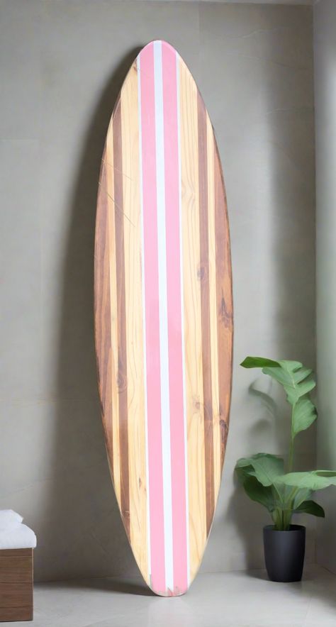 The Original Decosurf Bella Pink Surfboard Artwork Decor. Luxury hand-crafted wood surfboard decoration and artwork.Available in 2 through 6 foot sizes. Fully customizable upon request.This stunning surfboard features a timeless two-tone wood grain design, blending classic elegance with a touch of playfulness. The cheerful pink and white color scheme adds a vibrant twist, while the golden oak stained center stripe and natural wood stringers create a harmonious contrast. Deep, rich stained stripes elegantly frame the board, emphasizing its tropical allure. This exquisite decorative surfboard will be meticulously handcrafted with love, exclusively for you.The natural aspects of each board, including knots and woodgrain tone, will vary per individual product. I carefully analyze the woodgrain Custom Paddle Board, Surfboard Art Design Simple, Diy Surf Board, Diy Surfboard Decor, Surfboard Decoration, Surf Board Art, Surf Board Decor, Surfboard Artwork, Diy Surfboard