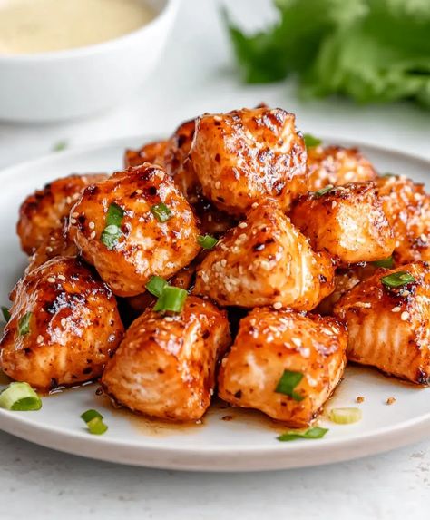 Mouthwatering Honey Garlic Salmon Bites Recipe - Balsamic Butter Salmon Bites, Honey Butter Garlic Glazed Salmon Bites, Honey Garlic Salmon Bites Air Fryer, Glazed Salmon Bites, Hot Honey Salmon Bites, Easy Honey Garlic Salmon, Honey Garlic Salmon Bites, Garlic Salmon Bites, Honey Garlic Glaze