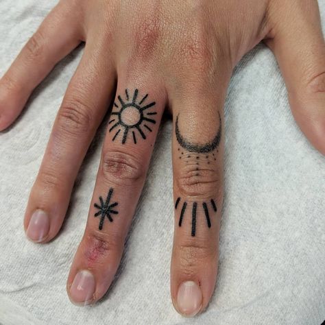 Rosie-May on Instagram: “Handpoked ~ cosmic fingers. Olivia had some fine dotwork tattoos on her index finger that she asked me to make bolder 💪➡️ we added a sun…” Sun Knuckle Tattoo, Sunburst Finger Tattoo, Finger Tattoos Sun, Small Sun Tattoo Finger, Sunshine Finger Tattoo, Half Sun Finger Tattoo, Sun And Moon Finger Tattoo, Sun Finger Tattoo, Tiny Finger Tattoos