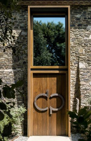 Villa CP by Zest Architecture: a former farmhouse is transformed into a sustainable holiday home in Spain | Architecture | Wallpaper* Magazi... Front Door Entrance Decor, Door Entrance Decor, Architecture Journal, Restored Farmhouse, Stone Farmhouse, Farmhouse Front Door, Architecture Wallpaper, Front Door Handles, Front Door Entrance