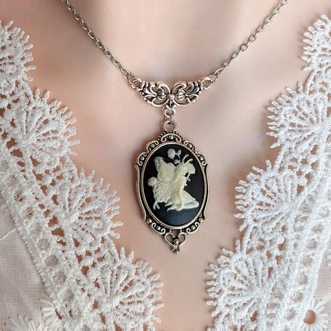 Embracing the magic of International Fairy Day ✨🧚‍♀️ Let your imagination soar and sprinkle a little enchantment into your day! Have I shown you this enchanting Fairy Cameo necklace yet? She's just one of the pieces in my mythical creatures collection. Pop by my Etsy shop to see the full line. ✨✨✨ ... #magic #InternationalFairyDay #believeinmagic #beautiful #madeincanada #torontoartist #toronto #papillionera #fairy #fae Fairycore Pendant Jewelry For Gifts, Fairy Style Pendant Jewelry Gift, Fairycore Butterfly Necklace Gift, Dark Fairy Necklace, Fairy Pendant Necklace, Cameo Necklace, Believe In Magic, Enchanted, Mythical Creatures