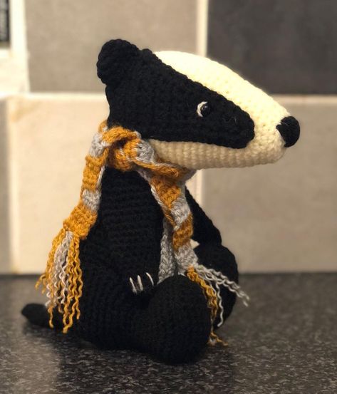 Hufflepuff.Proud.l on Instagram: “Just finished this lovely order for a hufflepuff. I really love this badger, it helps I’m a hufflepuff. #harrypotter #crochetbadger…” Hufflepuff Crochet, Crochet Hufflepuff Blanket, Honey Badger Crochet Pattern Free, Hufflepuff Badger Crochet Pattern, Harry Potter Crochet Stuffed Animals, Dolby Harry Potter Crochet, Harry Potter Crochet, Amigurumi Toys, Amigurumi Crochet