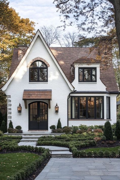 White French Cottage Exterior, Tudor Style Homes Exterior Update, Quaint Houses Exterior, Tudor Style Homes Small, French Farmhouse Architecture, Exterior House Colors Cottage Style, Modern Country French Decor, Blue Window Trim Exterior, White English Cottage Exterior